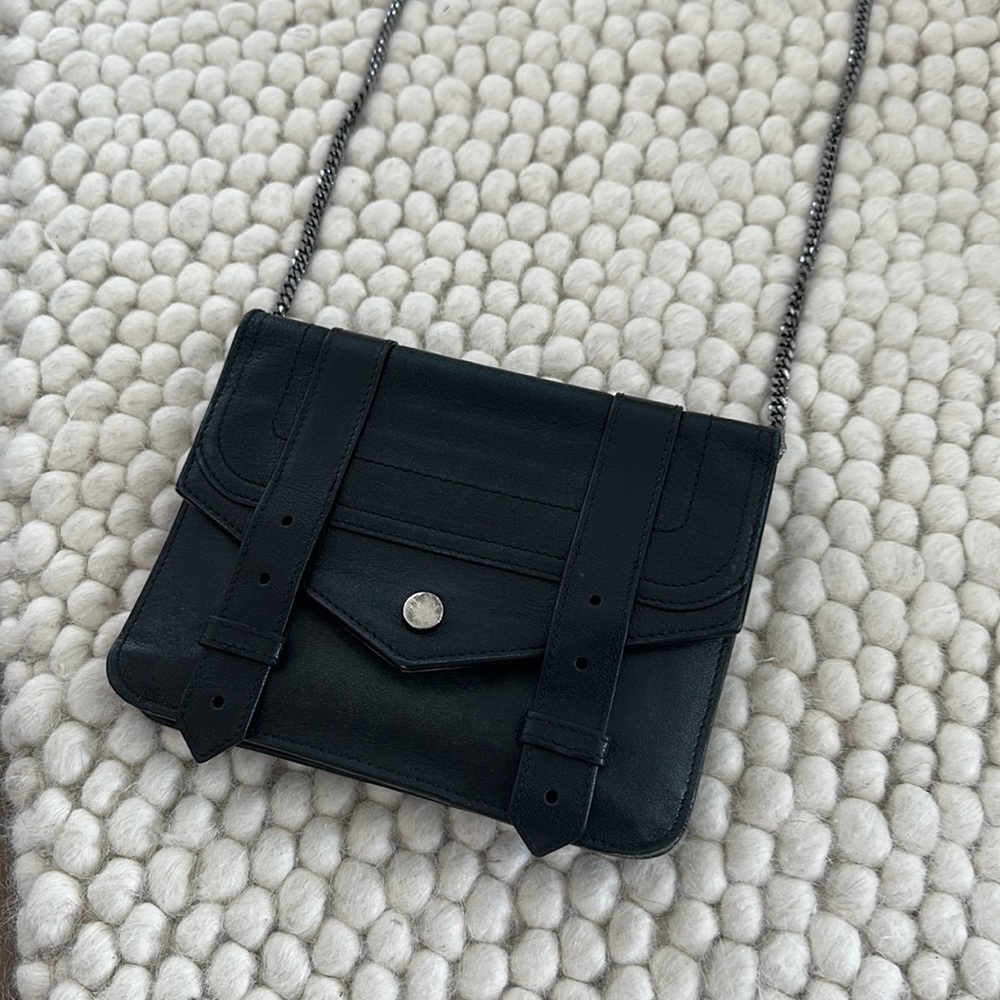 Proenza Schouler wallet on a chain